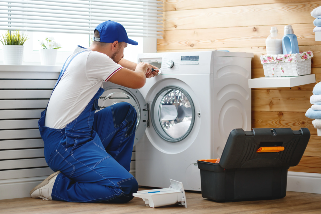 Handyman Repairing Appliances | Image Credit: servicepower.com